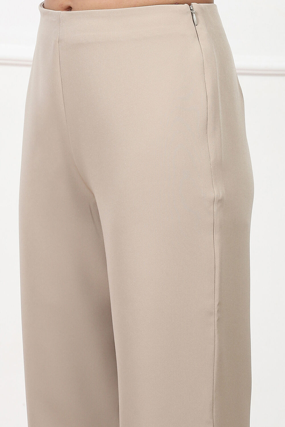 Beige Solid Relaxed Fit Pants image number 1