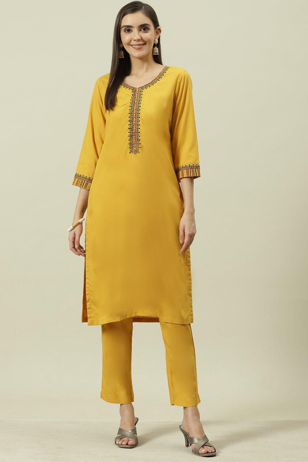 Yellow Solid LIVA Straight Kurta Regular Pant Suit Set image number 0
