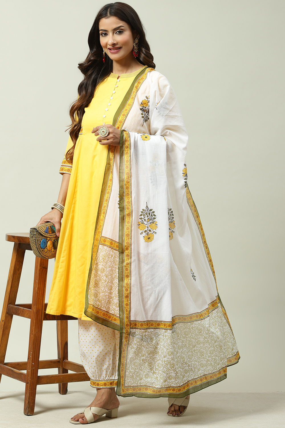 Yellow Cotton Flared Kalidar Kurta Slim Pant Suit Set image number 0